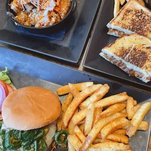 Jalapeño burger, French onion grilled cheese, heart attack tots