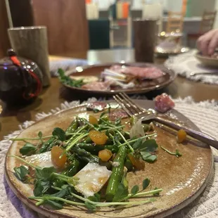 Asparagus salad in the front, charcuterie in the back