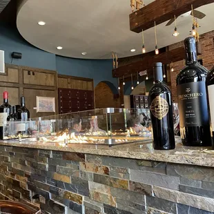 bottles of wine on a bar