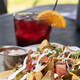 Pulled Pork Nachos. Ice Cold Drink. Yes &amp; yes.