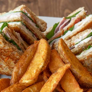 The &quot;club&quot; is one of our fancier sandwiches, but you don&apos;t have to be fancy to eat one!