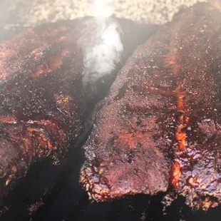 Chef Tony&apos;s slow-smoked baby back ribs.