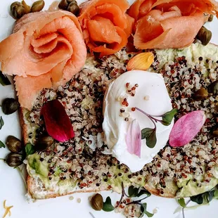 Salmon toast (lemon cream chs, mashed avo, poached egg, caper, smoked salmon, quinoa, on sourdough)