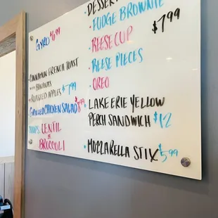 a menu on the wall of a restaurant