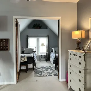 2nd bedroom with 2 twin beds and bathroom entrance