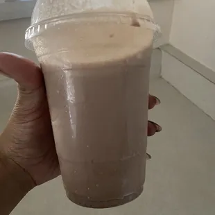 Milk shake which it's not a milk shake at all this is how they handed it to us very watery l