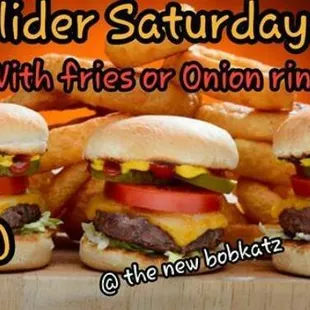 three burgers with fries and onion rings