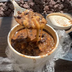 Yummy cheddar cheese in black bean chili