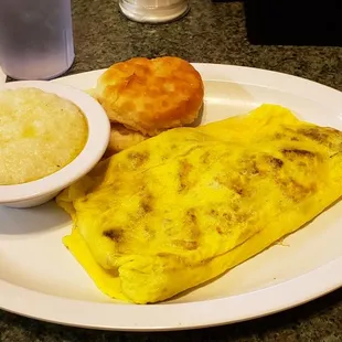 an omelet with a side of mashed potatoes