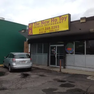 a car parked in front of the store