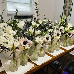 Bud vases used on the cocktail tables