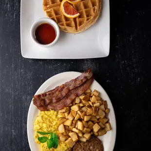 Mountain Breakfast: Tasty waffle, two eggs, two bacon, two sausage patties, crispy russet potatoes, butter &amp; syrup.