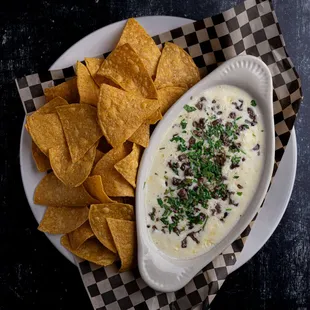 Queso Dip comes with generous portion of carne asada and chips.