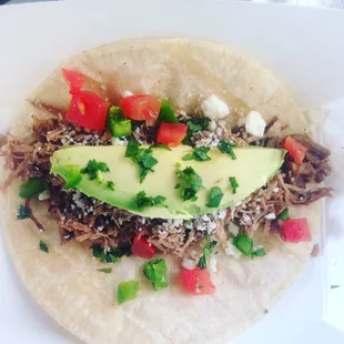 green chile braised brisket taco