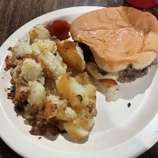 Cheeseburger grilled onions, German fried potatoes two Fox Trail