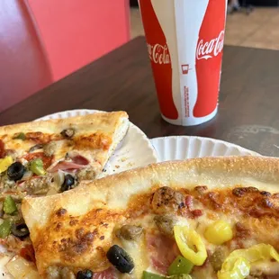 Specialty Pizza slices 2 slices and one drink 10.00  but they are huge slices.... good deal..... 4 thumbs up....