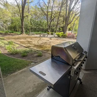 Grill and outdoor seating.