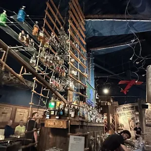 a bar with bottles of alcohol