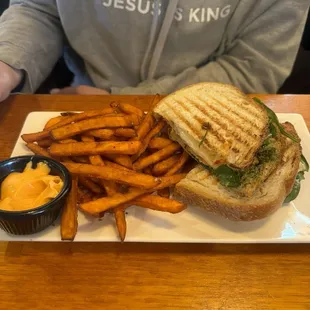 Chicken panini and sweet potatoes fries side of smash sauce