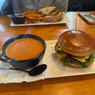 Classic smash burger with side of tomato soup