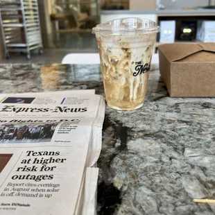 Iced Vanilla Latte with almond milk and sweet cream