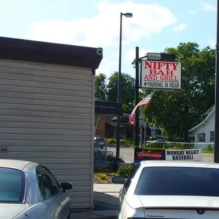 two cars parked in a parking lot