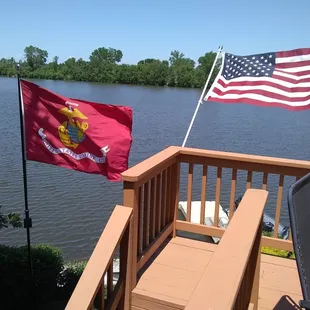a view of the water from a deck