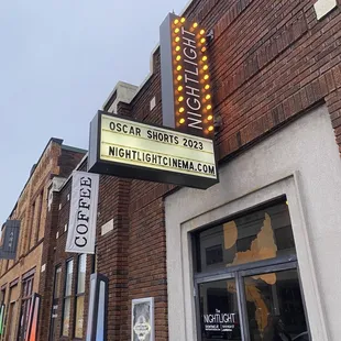 The front. Skip the minuscule street parking &amp; opt for the garage just across the main road. Short walk.