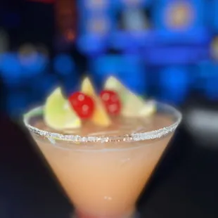 a cocktail in a martini glass