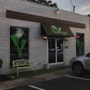 a car parked in front of the store