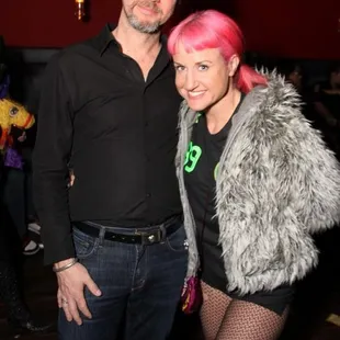 a man and a woman posing for a picture