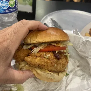 Hot honey and bacon chicken sandwich - extremely generous large fried chicken breaded and fried to perfection! Came with crispy bacon too!