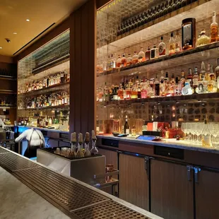 a bartender behind the bar