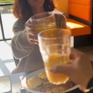 Cheers to delicious orange juice!