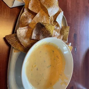 Extremely large queso bowl and fried chips. Good portion for something under 8 bucks.