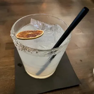 a drink with a slice of orange