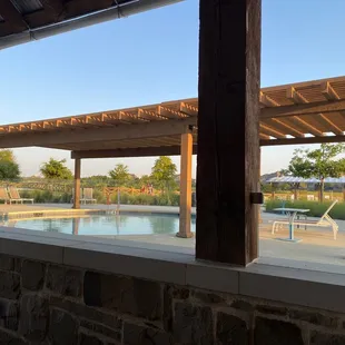 View of neighborhood pool from patio