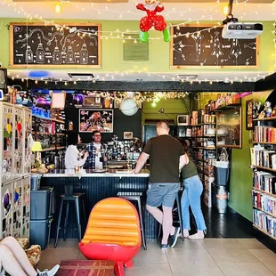 people sitting at the bar