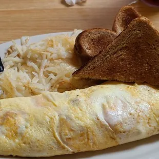 Ham, cheese and onion omlet, wheat toast and hash browns