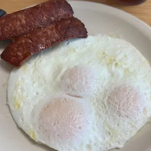 Over easy eggs and sausage