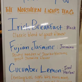 a white board with a list of teas