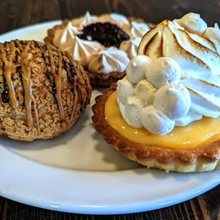 three pastries on a plate