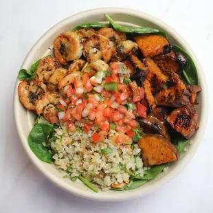 Athlete Bowl: Pan-Seared Shrimp, Roasted Sweet Potatoes, Herb Cauliflower Rice, Baby Spinach, and Factory Pico.