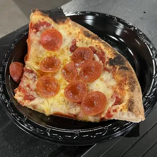 Pepperoni pizza was huge and delicious. Wood fired.