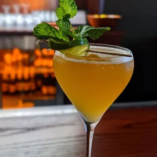 a cocktail in a martini glass