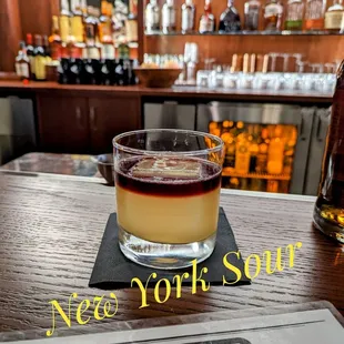 a shot of a drink on the bar