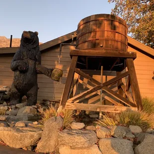 a bear statue and water tower