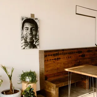 a table and bench in a restaurant