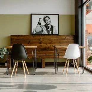 a dining room with a table and chairs