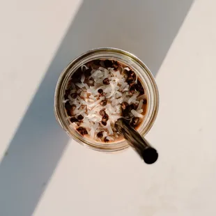 a cup of coffee with a spoon in it